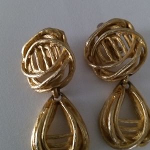 Earrings gold tone. 2"x1". $22